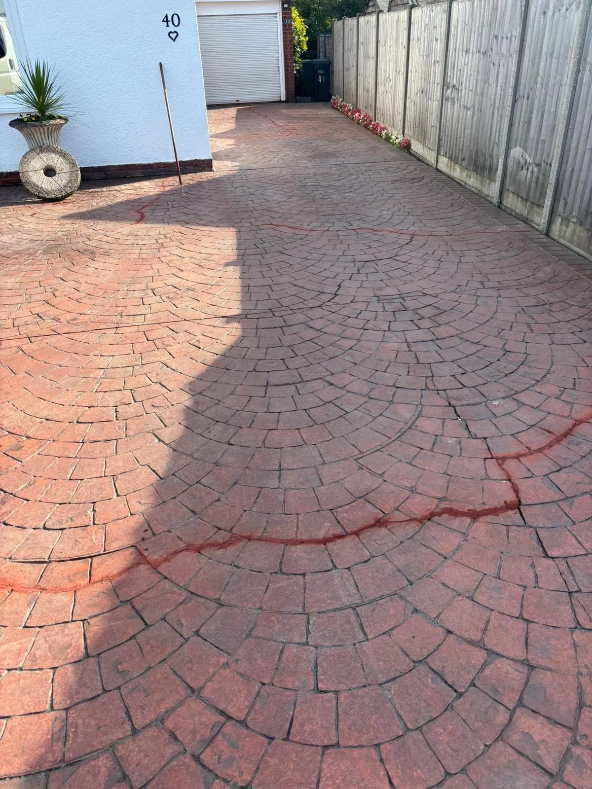Charcoal pattern imprinted concrete driveway
